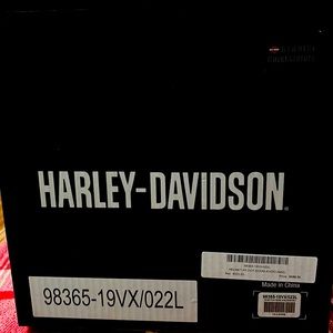 HD helmet 2xx.Only been worn 40 miles been stored in the box in the dust cover